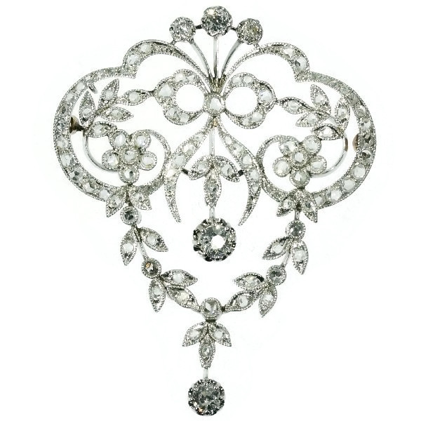 Elegant platinum brooch and pendant in Garland style